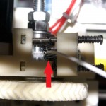 Spring to hold the filament aligned with hobbed bolt.